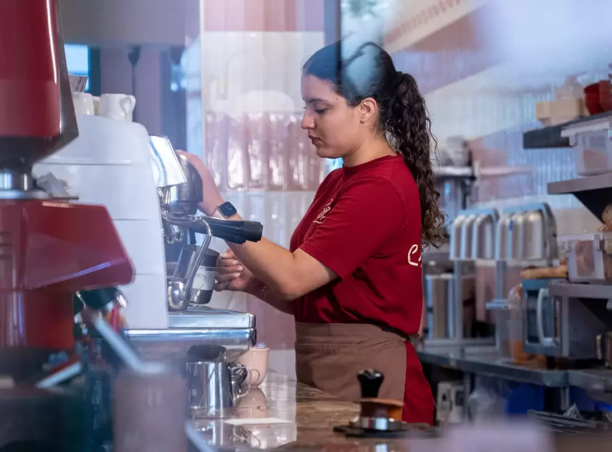 Barista preparing specialty coffee at Bobe Kitchen & Bakery in Downtown Miami